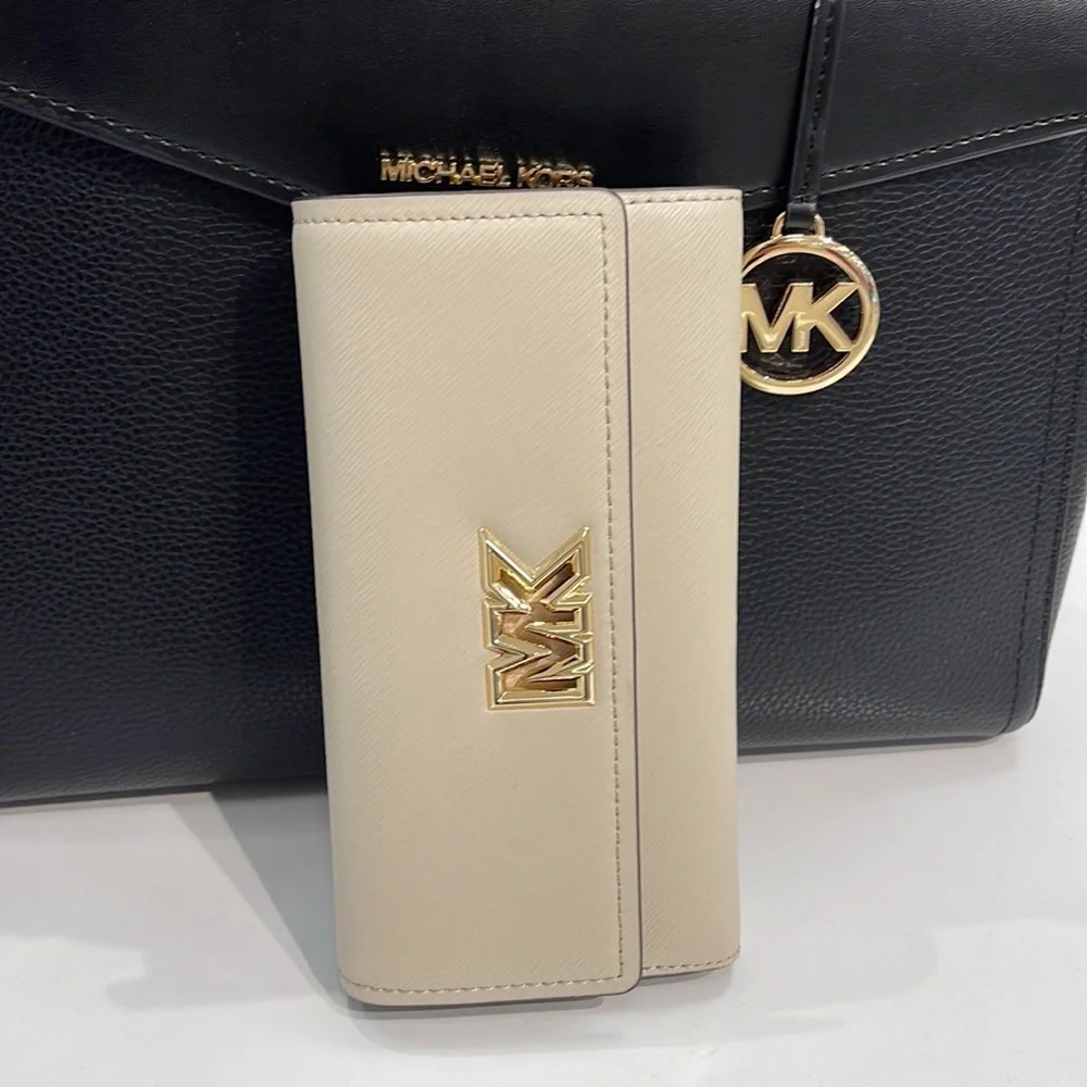 Michael Kors Mimi Large Saffiano Leather Bi-Fold Continental Wallet
Light Sand - Picture 13 of 16